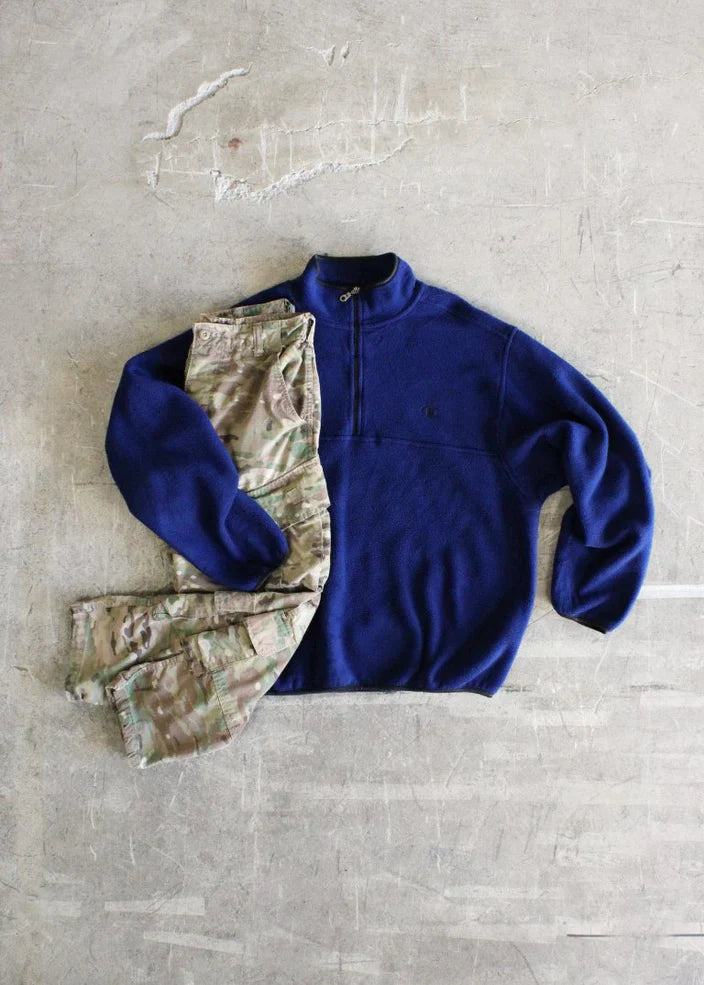 Authentic Champion fleece pull over with quarter zip collar paired with camo/ army cargo pants.